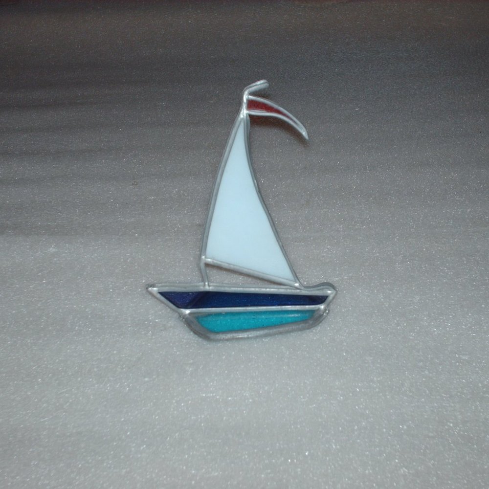 Vintage stained glass sailboat